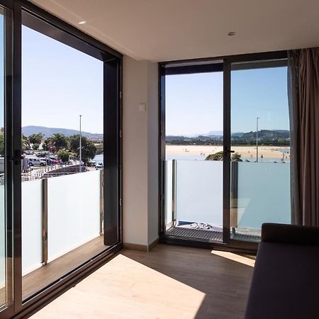Apartamentos Playa De Los Barcos Isla Bagian luar foto