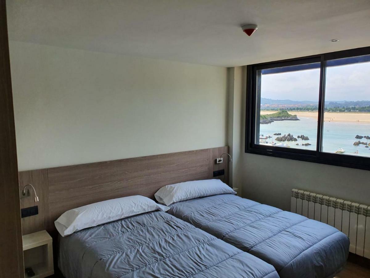 Apartamentos Playa De Los Barcos Isla Bagian luar foto